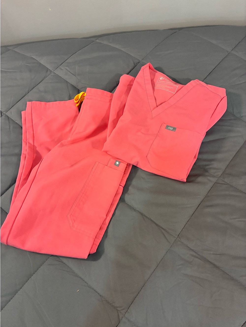 Figs limited edition neon pink scrub set.